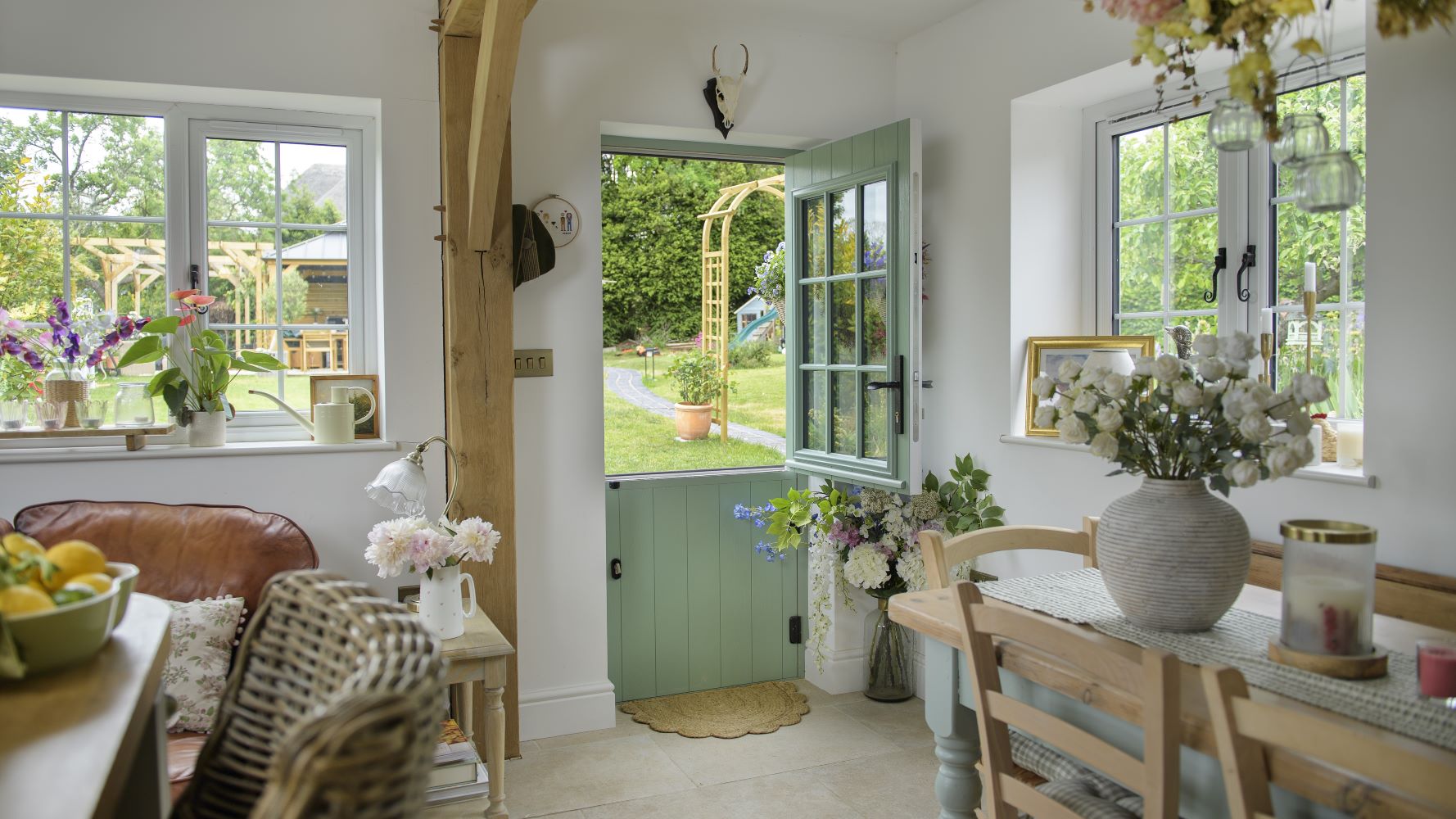 Aimee's Flint Beeston Composite Stable Door in Chartwell Green, view from insider her kitchen to garden